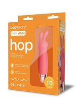 Load image into Gallery viewer, Bodywand Mini Vibes Hop Rechargeable Silicone Clitoral Stimulator - Orange
